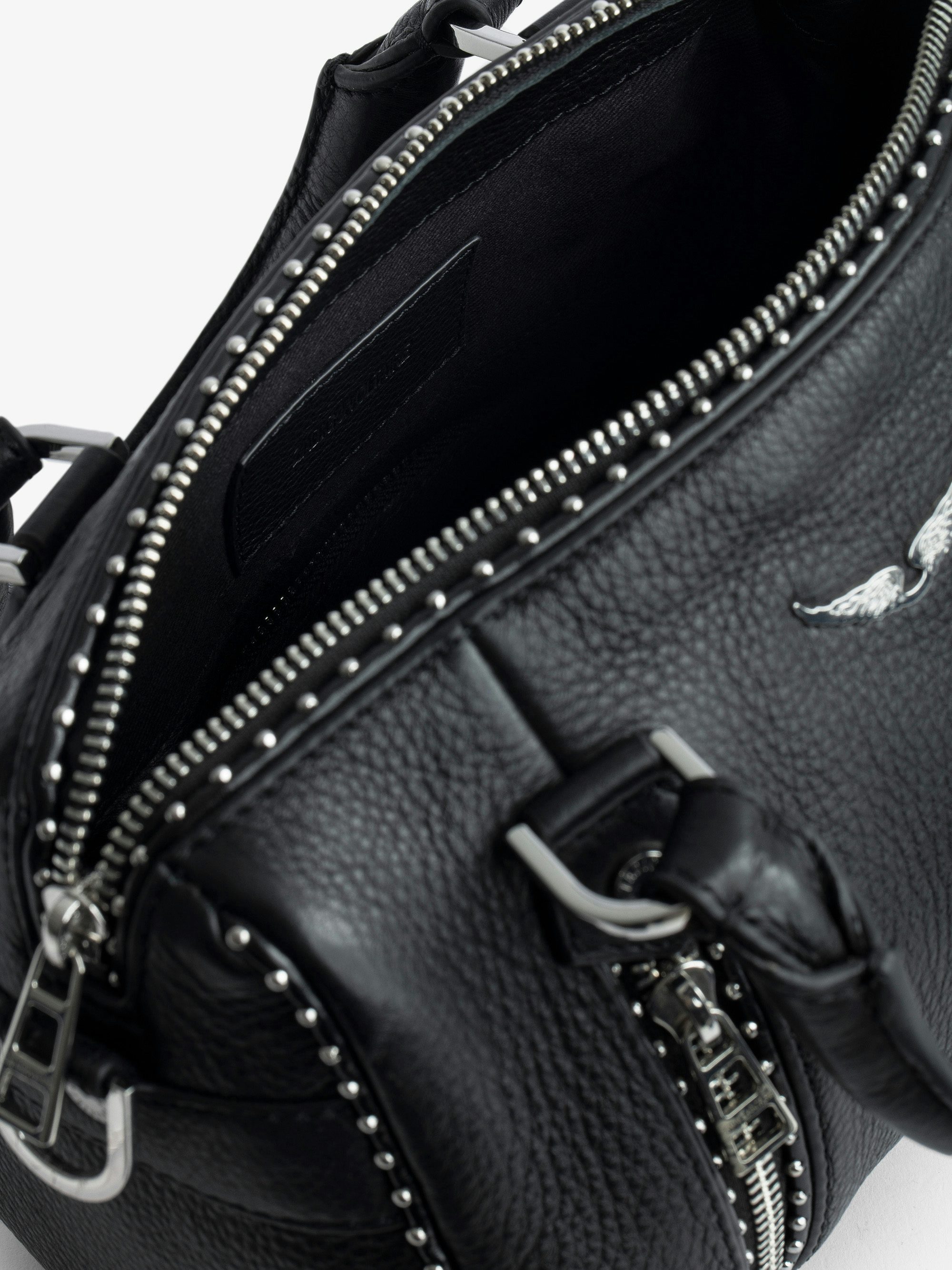 XS Sunny Studs Bag - Iconic Sunny XS bag in grained leather adorned with silver studs.